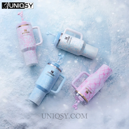 Stanley LoveShackFancy Quencher tumbler 40 oz cup in Coquette Bow Chantilly, Coquette Bow Winter Ice, Toscana Toile Alpine Blue, and Baby Bow Pink Peppermint designs